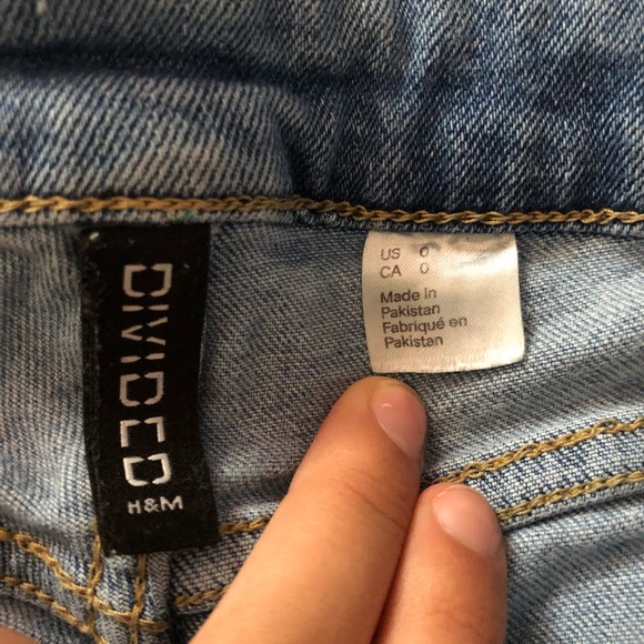 Light blue distressed jean shorts. - Picture 3 of 3